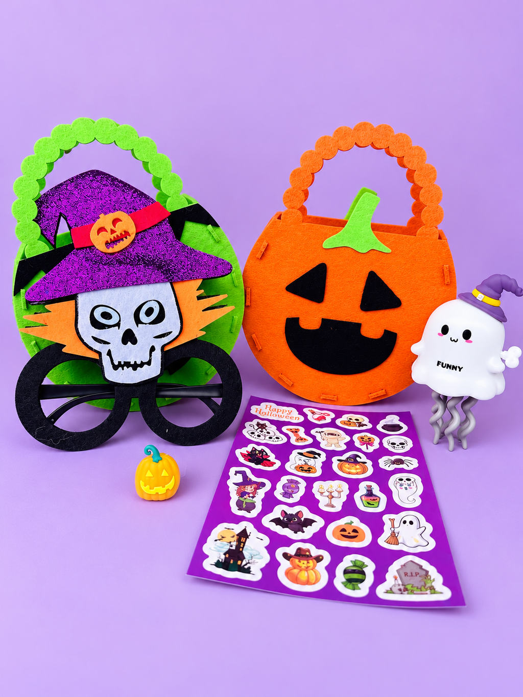 Halloween goodie bag for kids with stickers, skeleton glasses, pumpkin ring, wind-up ghost toy and Halloween bag